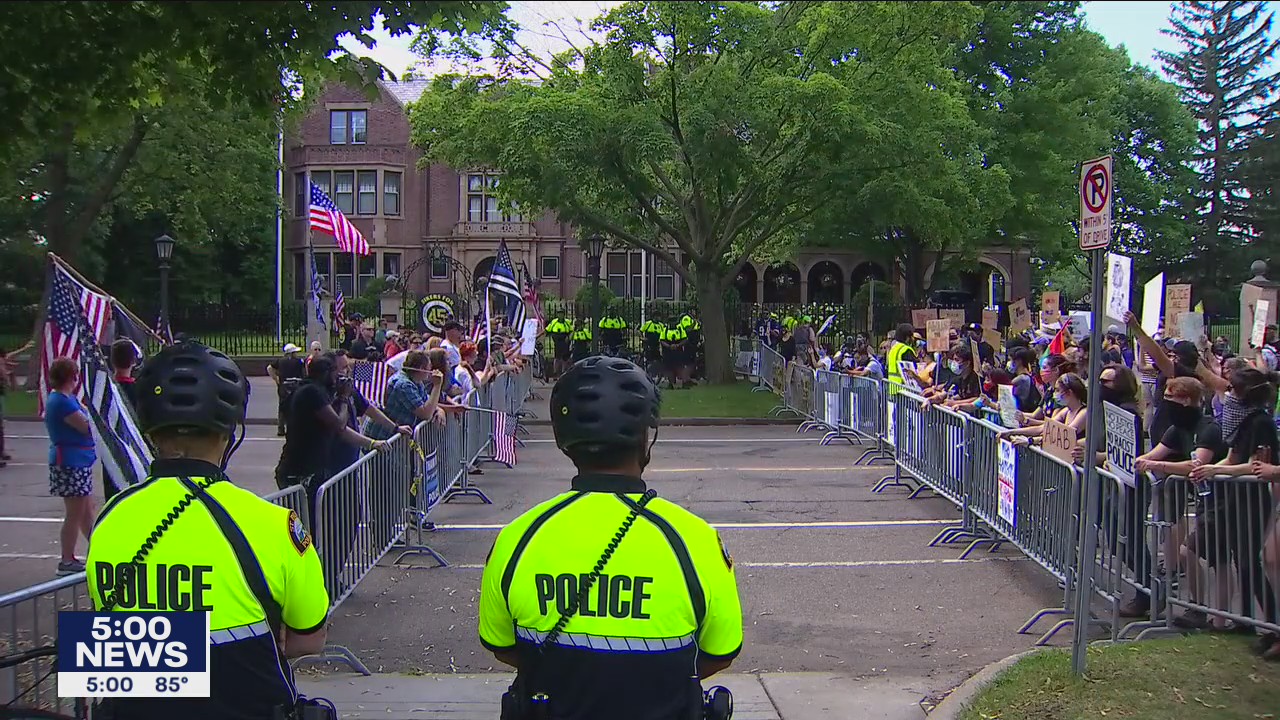 Protesters face off outside Minnesota Governor's Residence