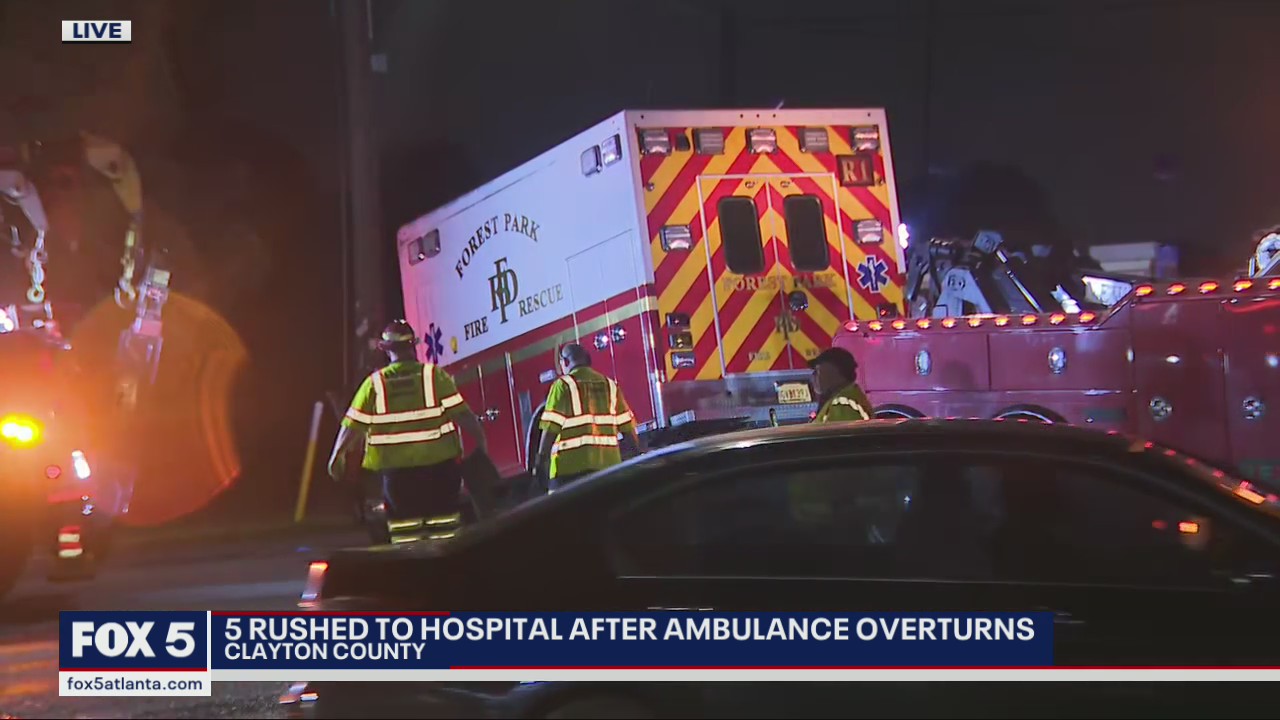 Ambulance overturns in Clayton County