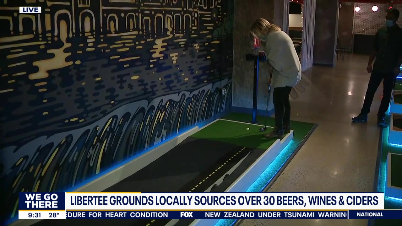 Jenn Fred goes for a hole in one at Libertee Grounds indoor mini-golf course