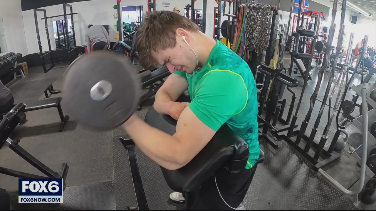 Born without a right hand, man empowers others through exercise