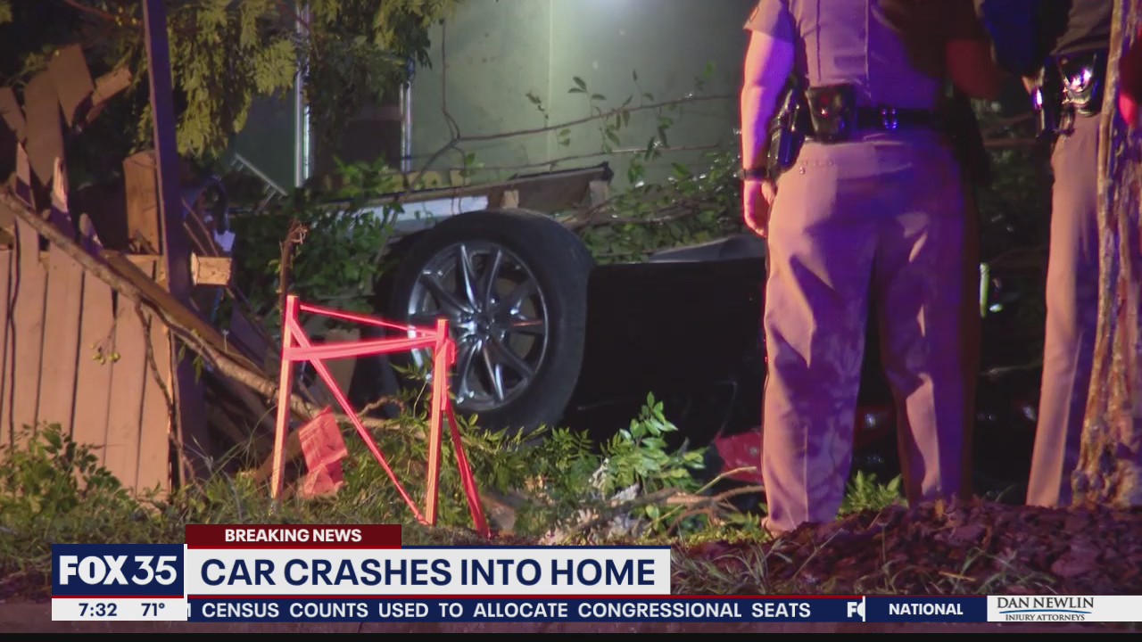 Car crashes into home in Orange County