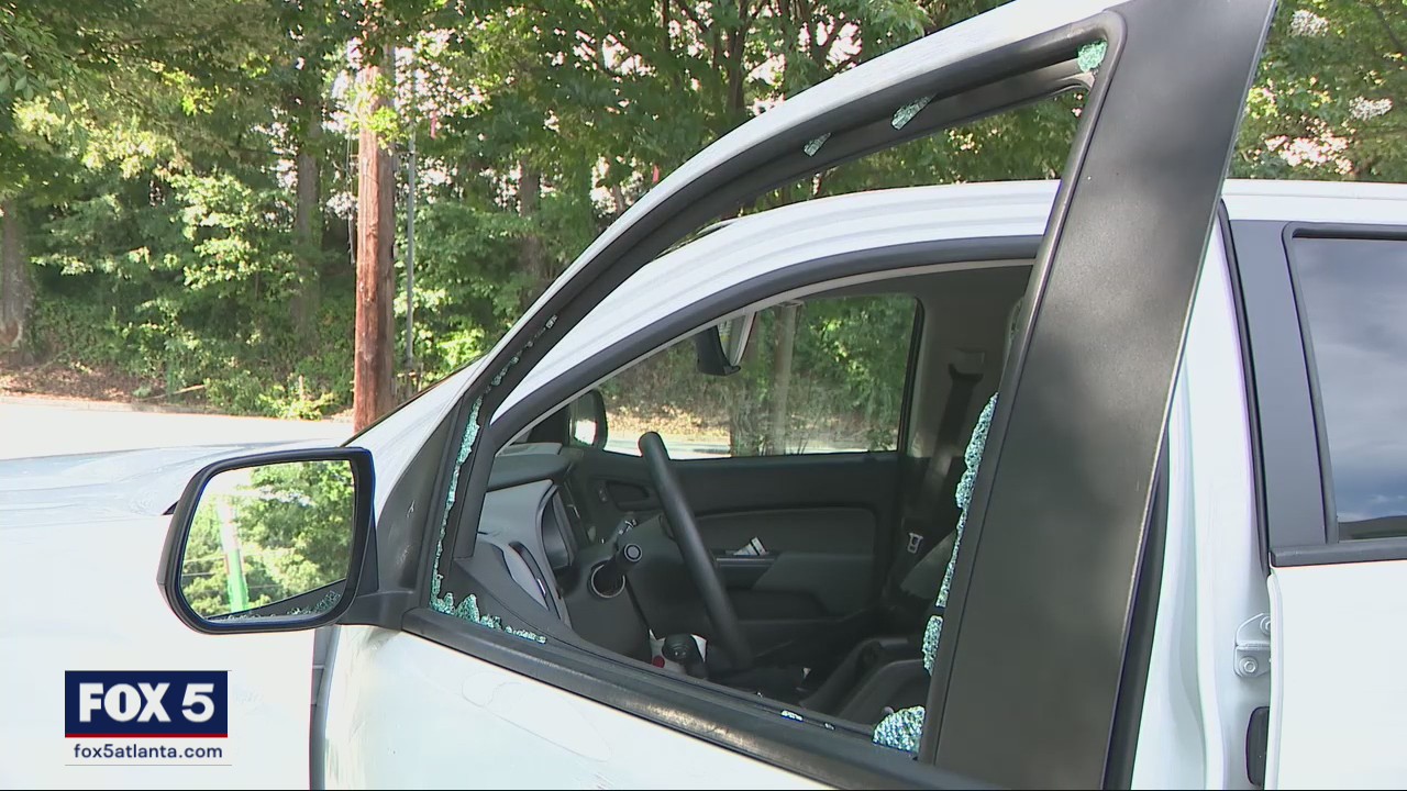 Woman says man smashed her truck window with a flare