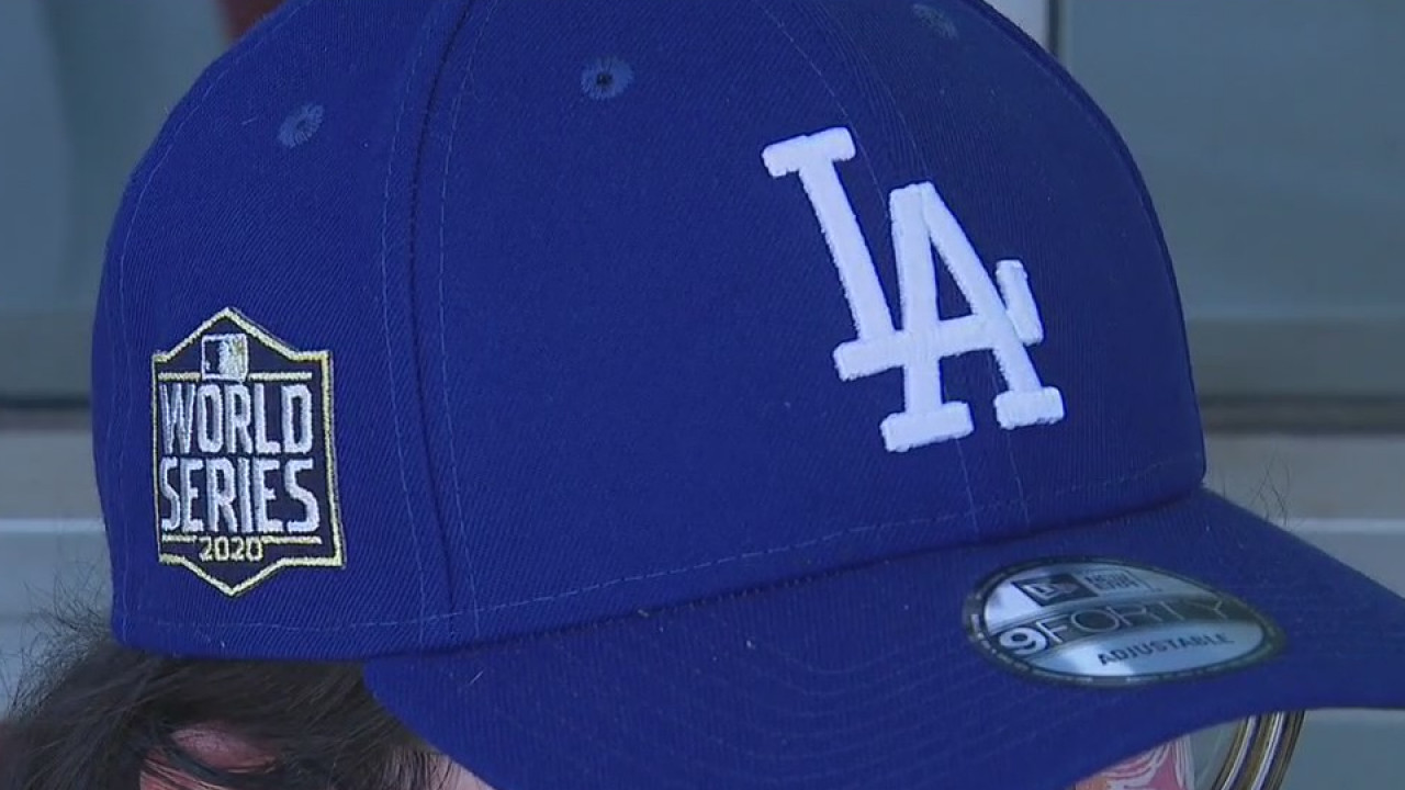 Excited Dodger fans wait in line for memorabilia in Pasadena