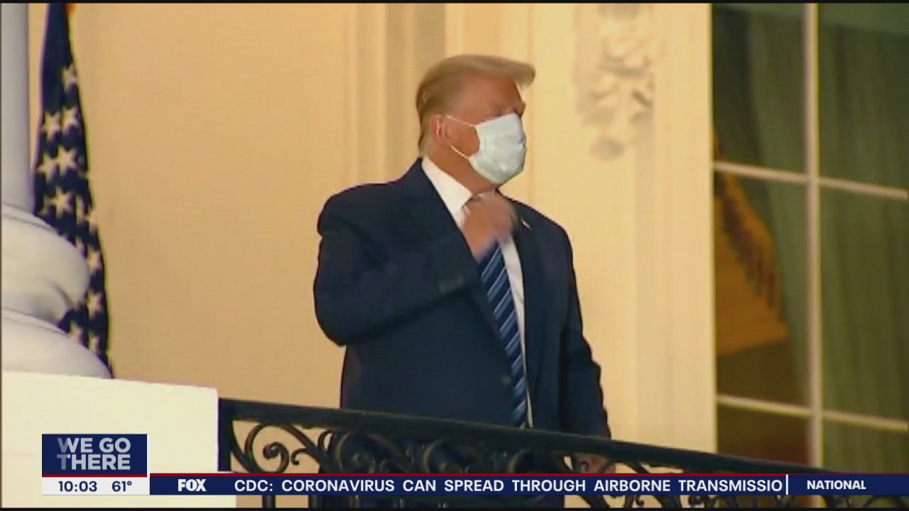 Trump, still infectious, back at White House — without mask