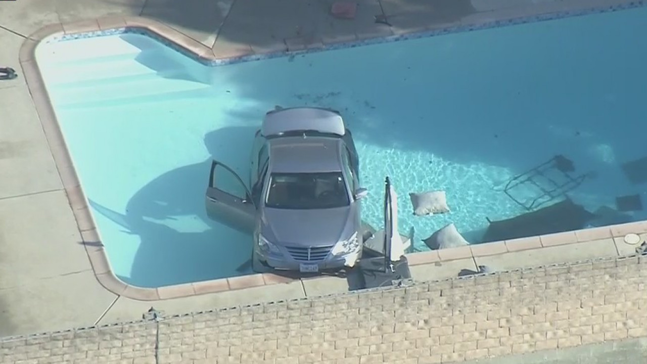Car into pool