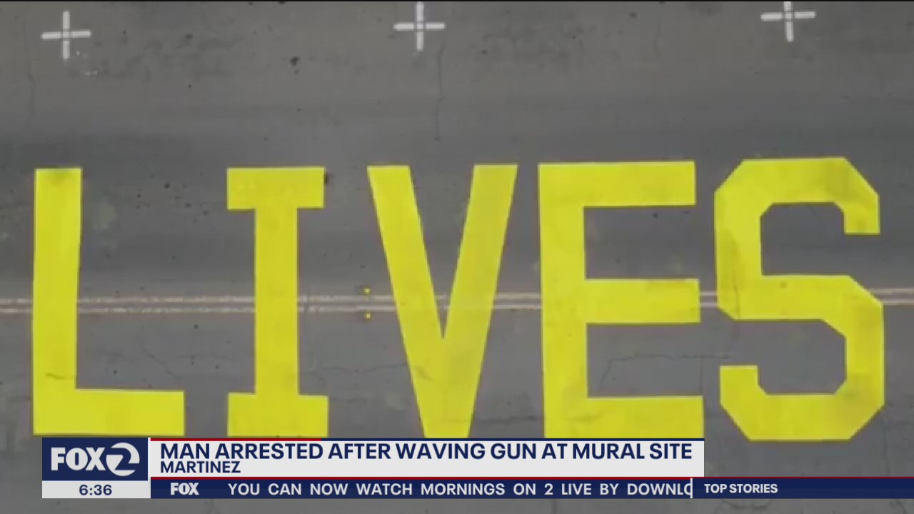 Man arrested after waving gun at BLM mural site