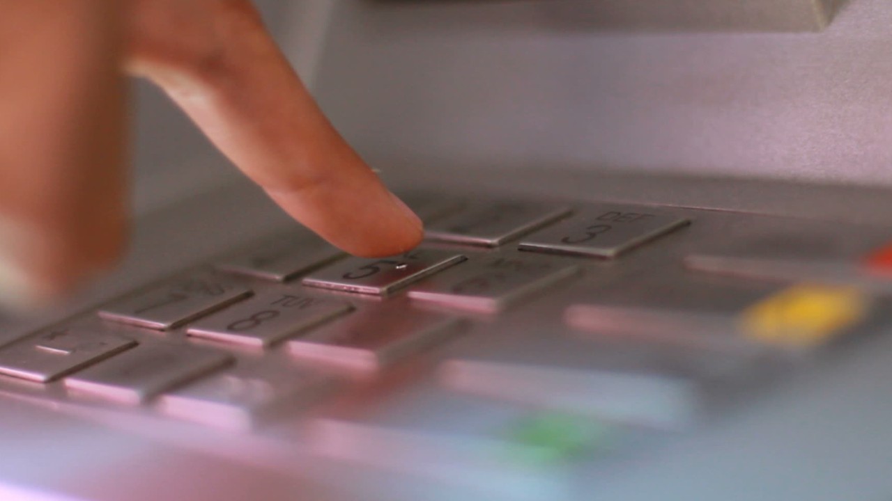 Couple charged after alleged shopping spree with mistaken $120K deposit
