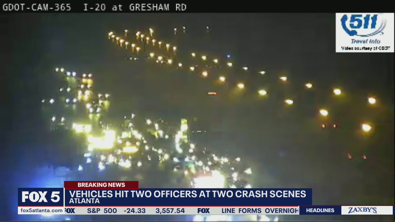 Two officers hit by vehicles while working crash scenes