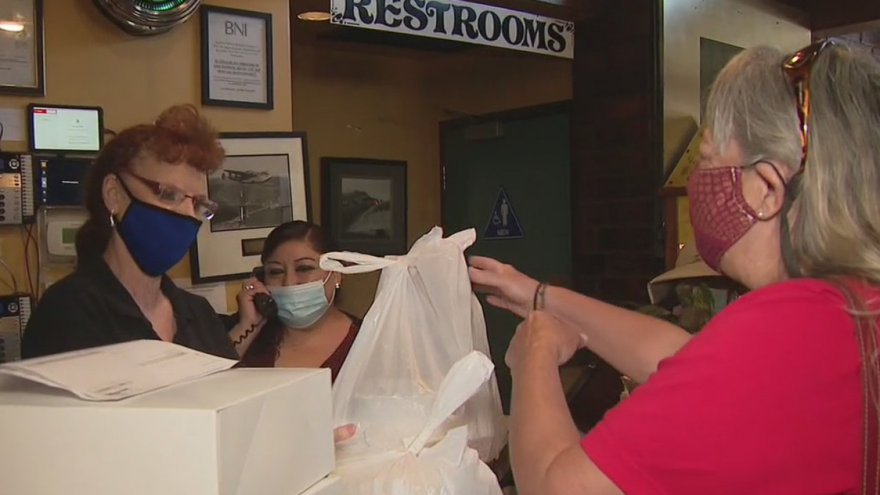 Restaurant employees work their final shifts as COVID-19 shutdowns force layoffs, furloughs