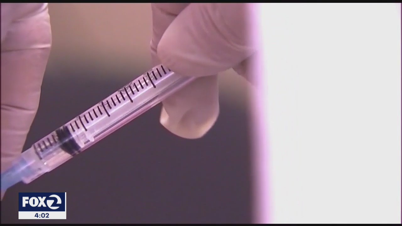 Calls for Moderna vaccine pause over allergic reactions