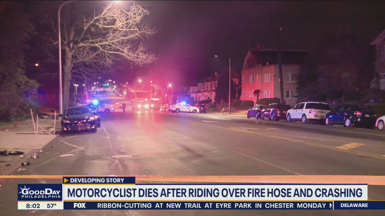 Motorcyclist dies after riding over fire hose, crashing