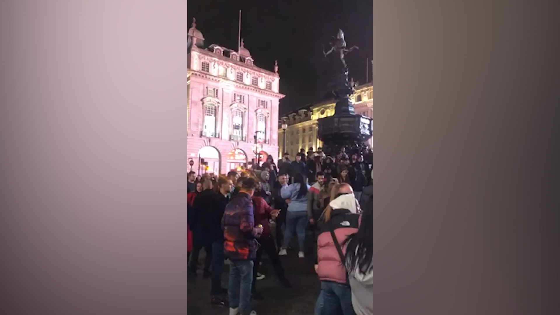 Crowds gathering at Piccadilly Circus in UK