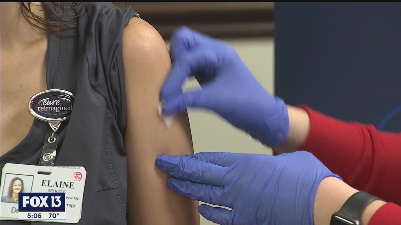 Medical professionals getting vaccinated