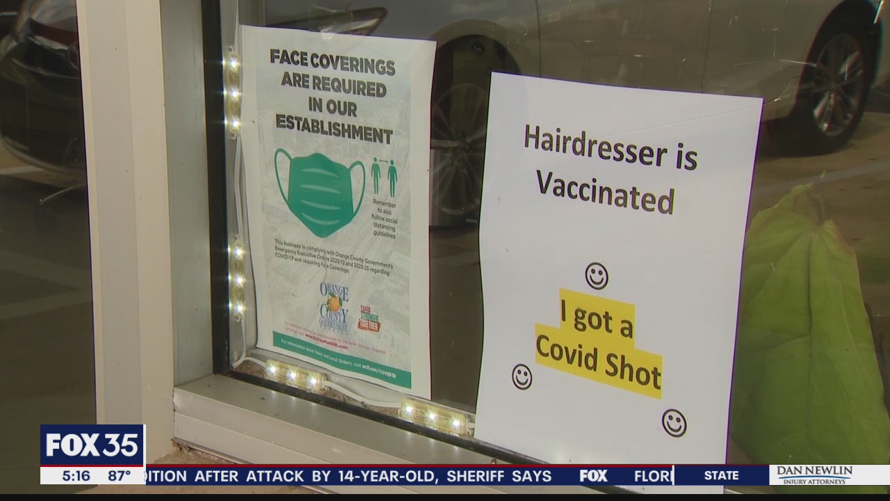 Florida salon owner posts 'I've been vaccinated' sign to welcome customers in