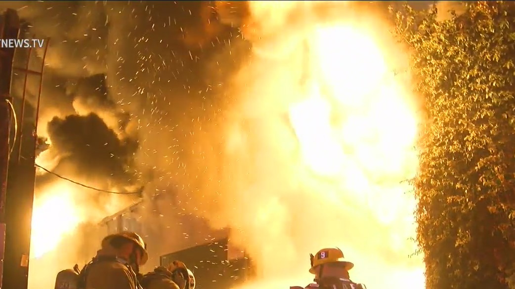 Commercial building fire erupts in South LA