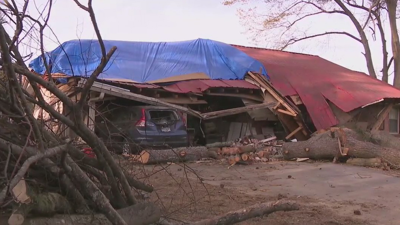 Retired police officer escapes home during storm