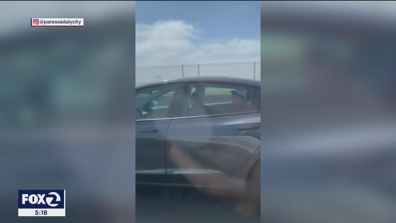VIDEO: Man seen riding in Tesla with no driver