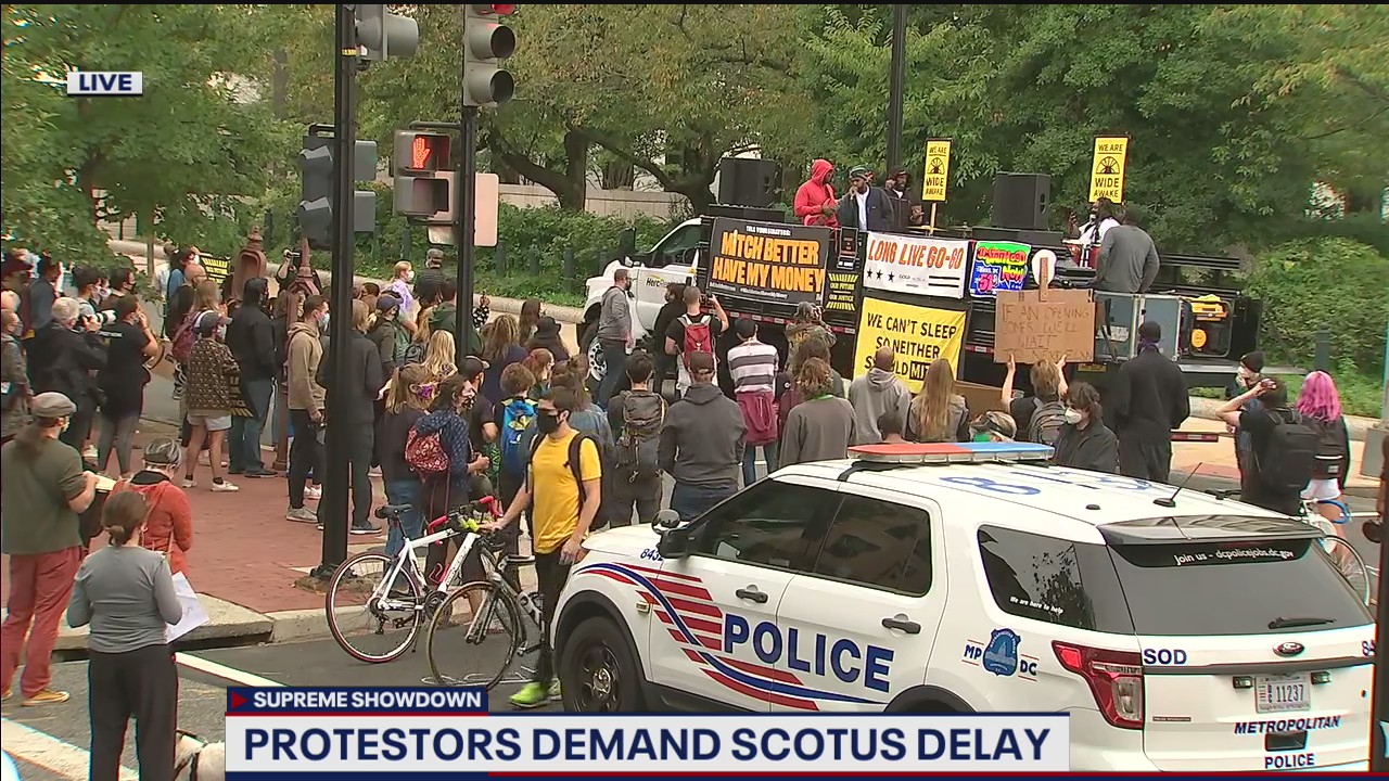 Demonstrators gather outside home of Mitch McConnell over efforts to fill Supreme Court seat
