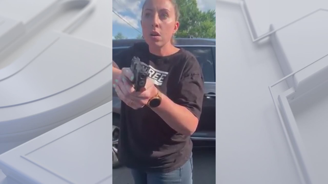 Online video shows woman pointing gun at black mom and teen in Lake Orion