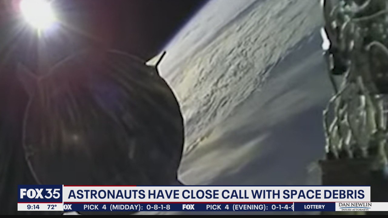 Astronauts have close call with space debris