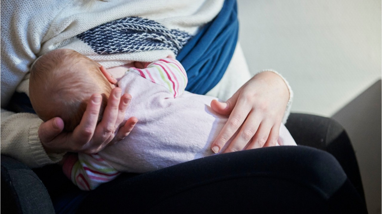 Japanese company designs wearable breastfeeding device for fathers to nurse babies