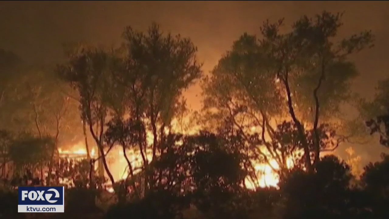Newsom rips 'climate change deniers' as California wildfires rage
