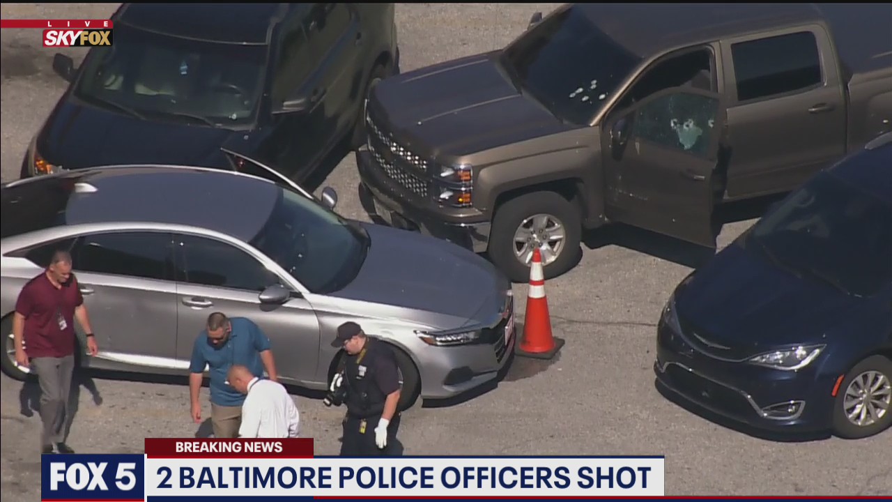 2 officers shot outside Baltimore area shopping center