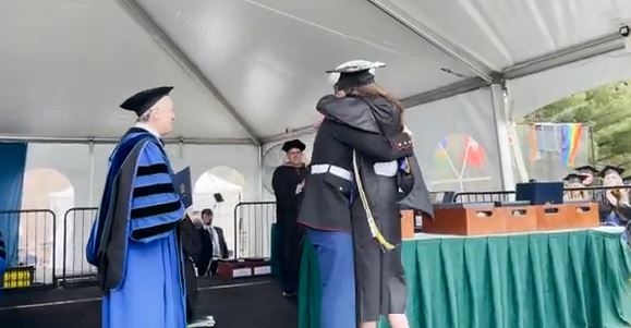 Marine surprises sister at college graduation in Massachusetts