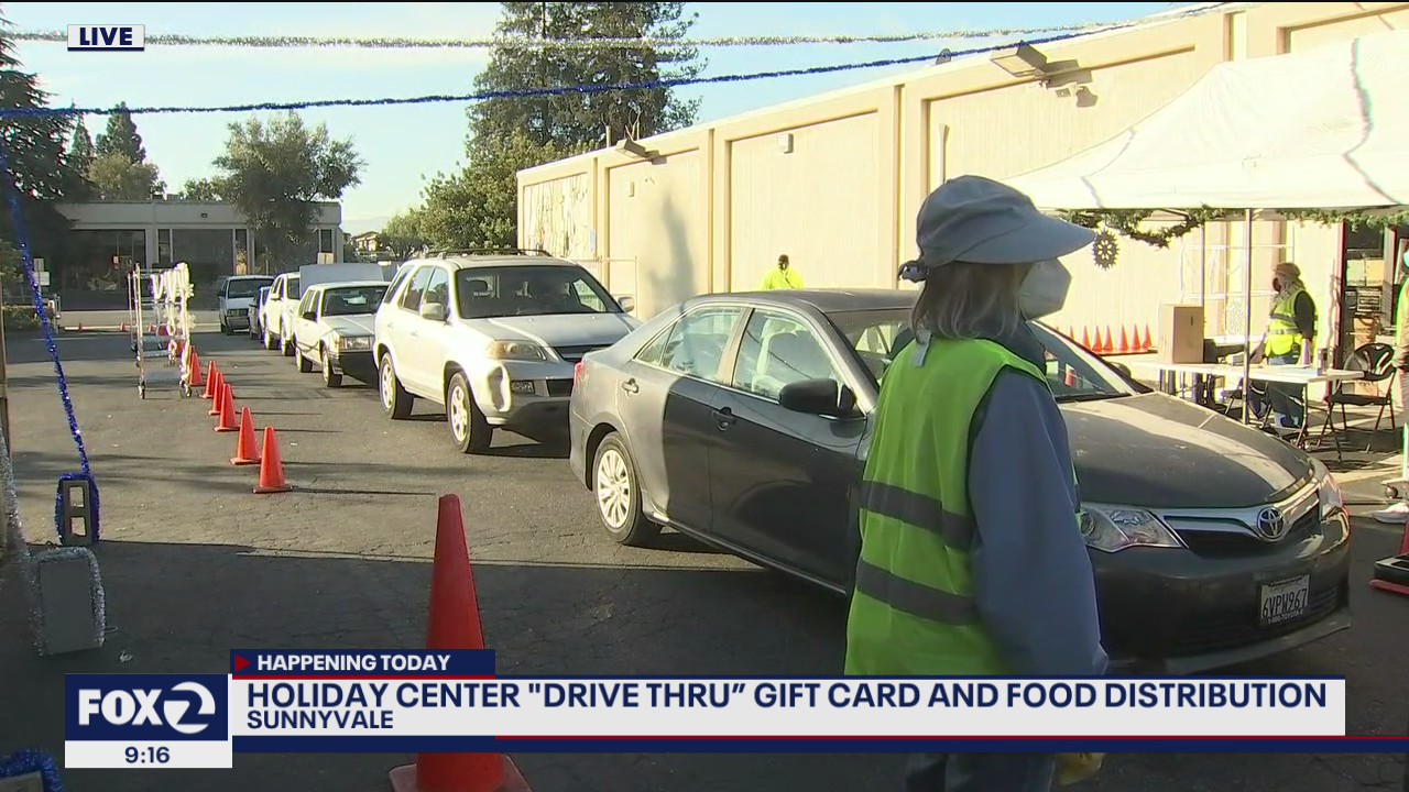 Holiday center 'drive-thru' gift card and food distribution