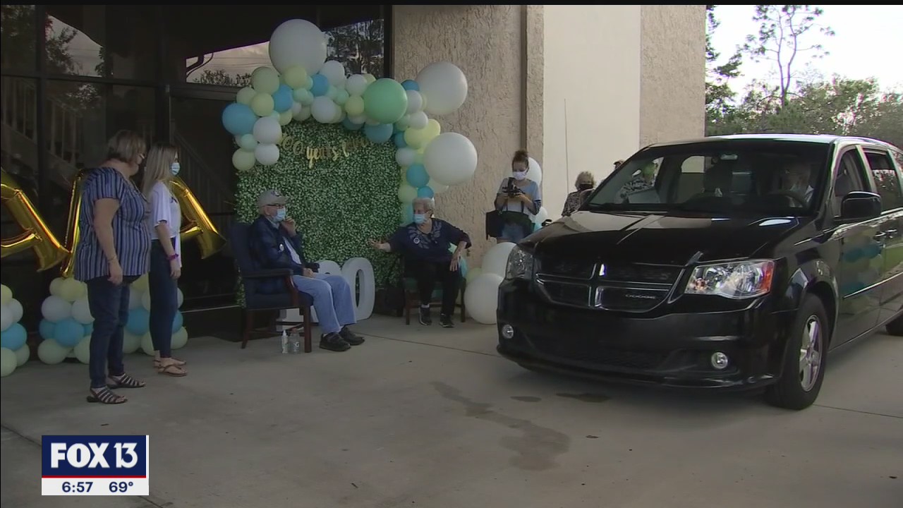 Drive-thru birthday for veteran's 100th