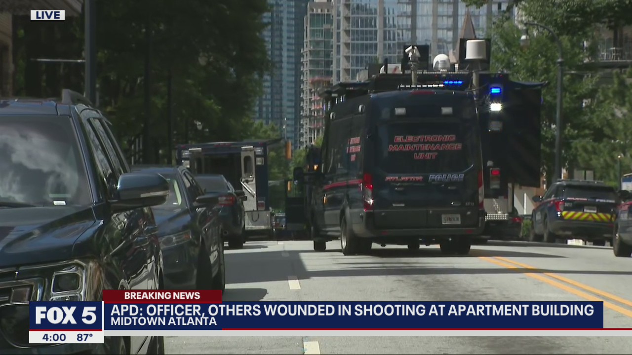 Officers ambushed by gunfire in Midtown apartment building elevator, suspect killed
