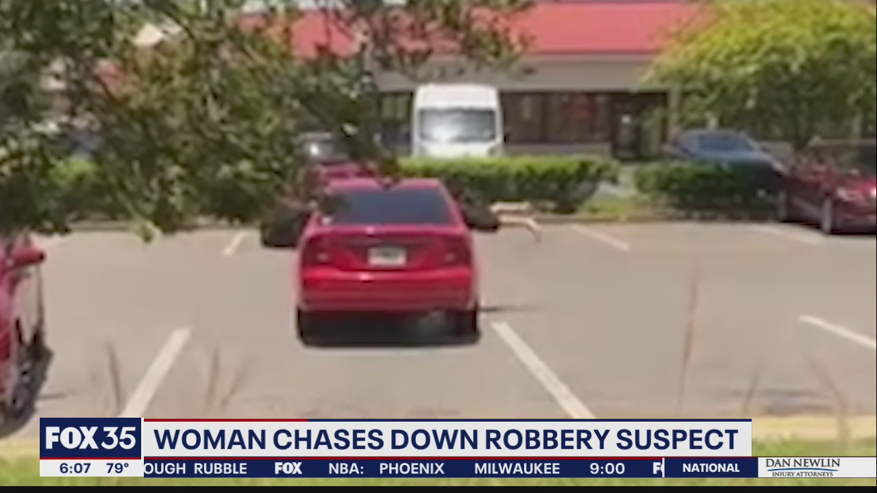 Victim jumps into suspect’s car after alleged purse snatching at bank