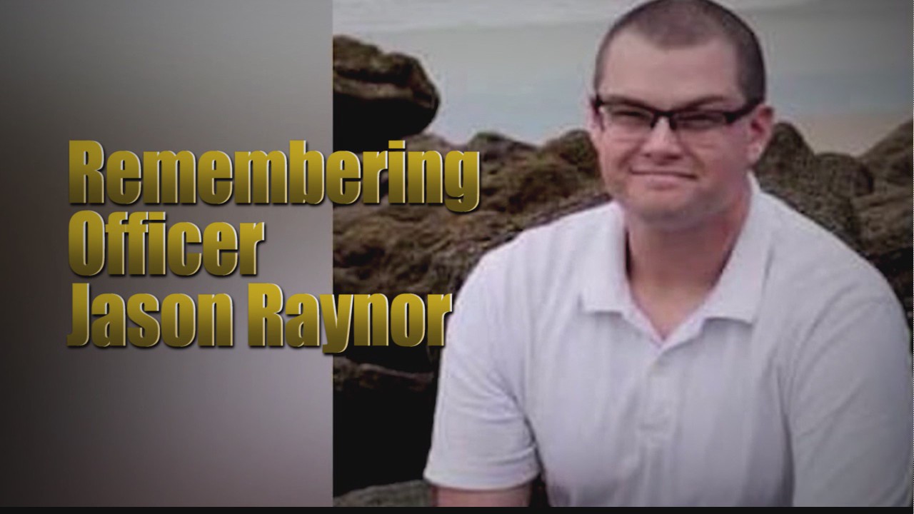 Community remembers fallen Officer Jason Raynor