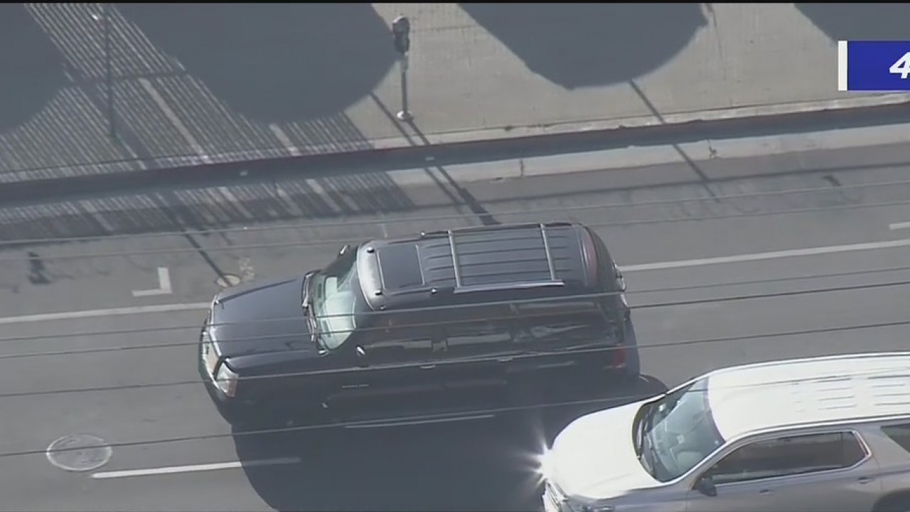 Police pursue an SUV in South Central Los Angeles