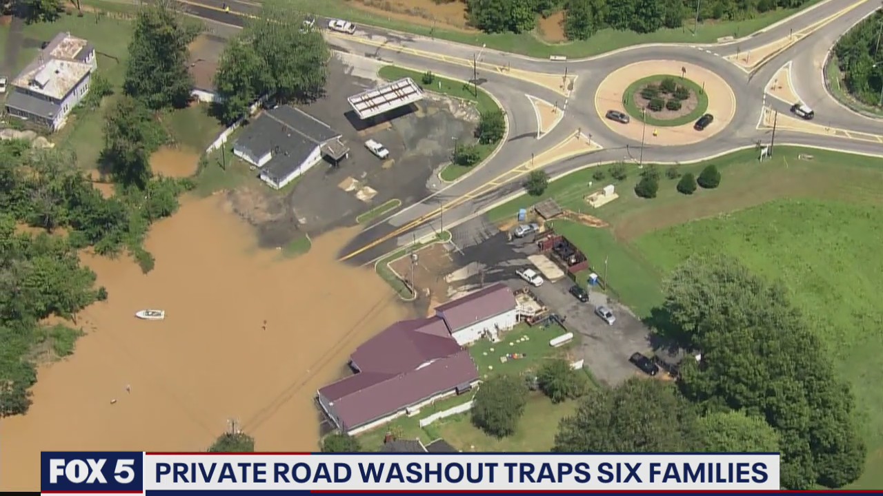 Private road washout traps six families