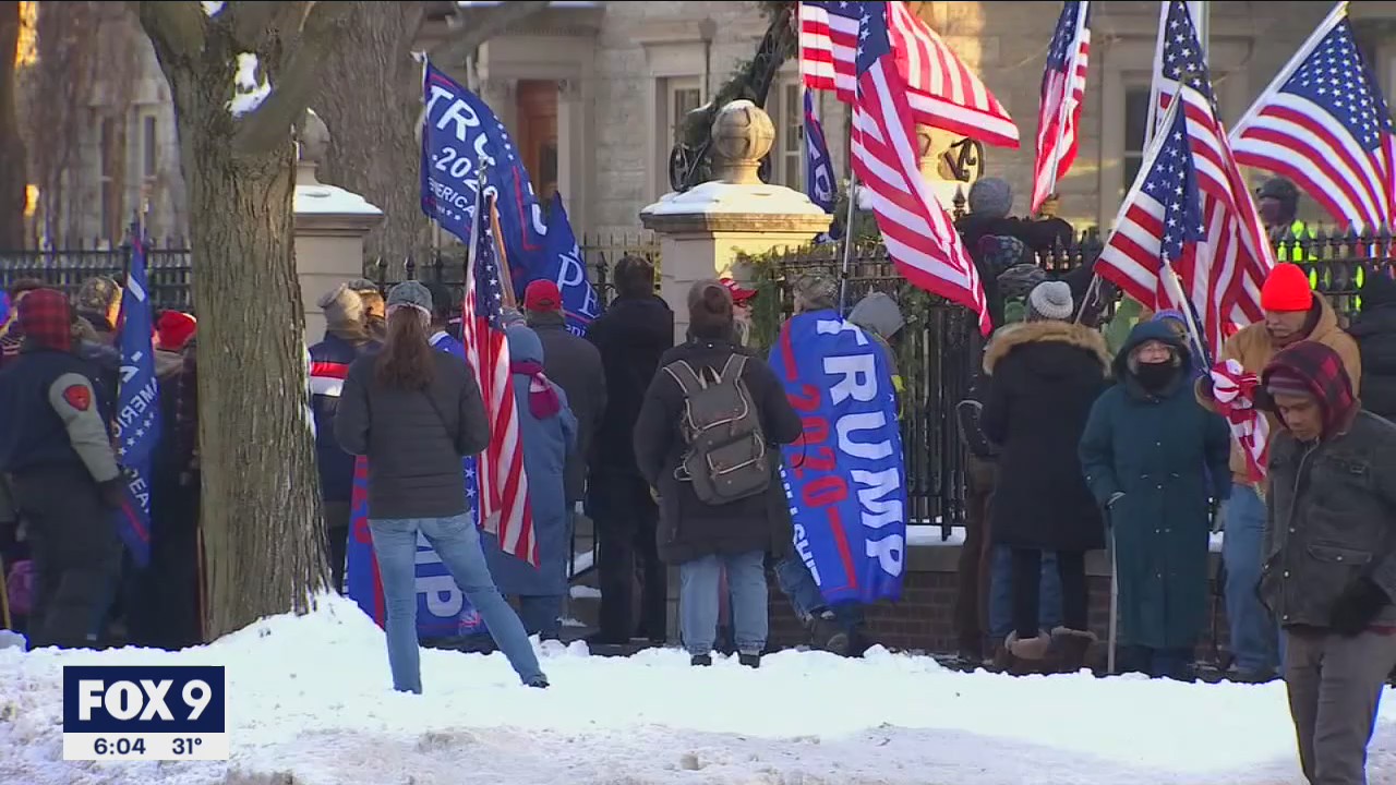 Protesters gather outside the Minnesota Capitol and Governors mansion