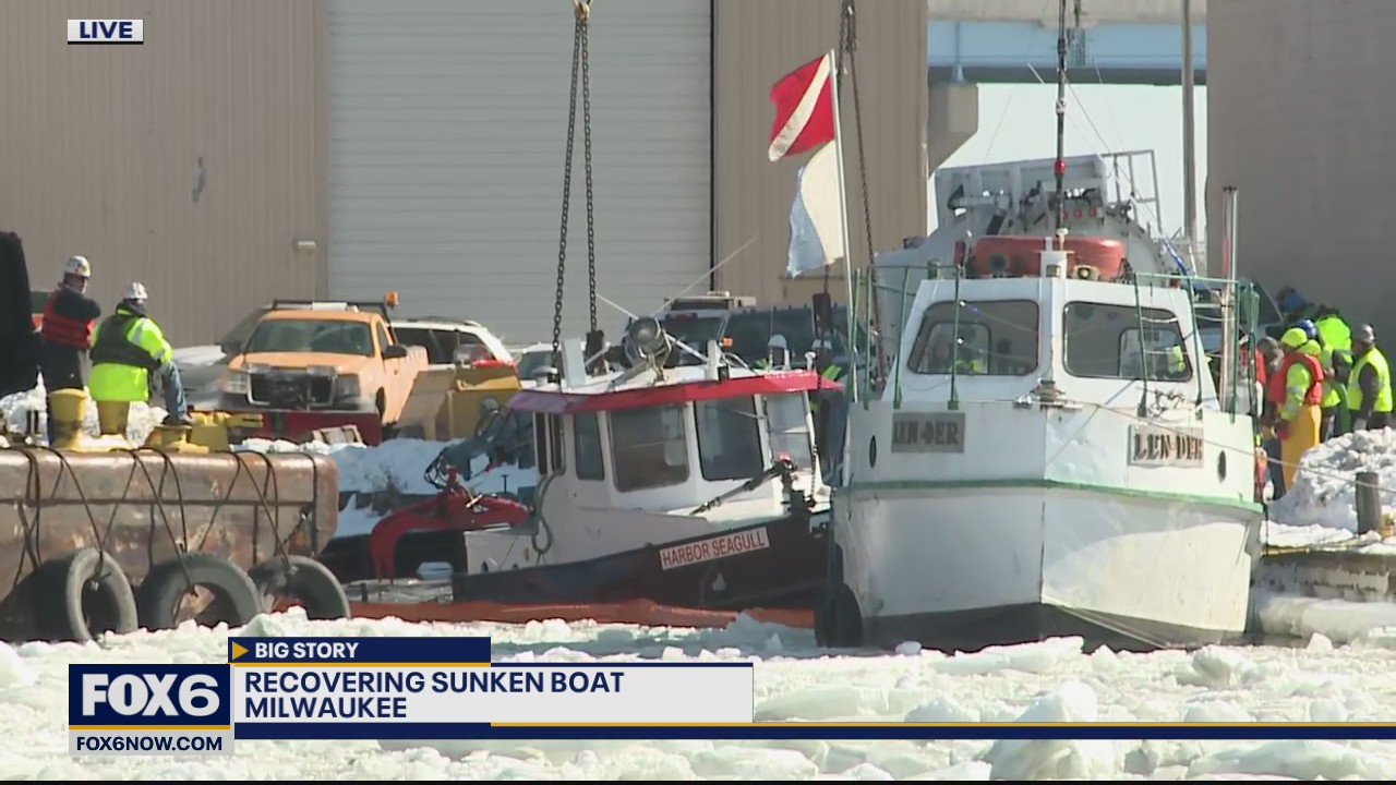 Crews retrieve Port workboat Harbor Seagull from river bottom