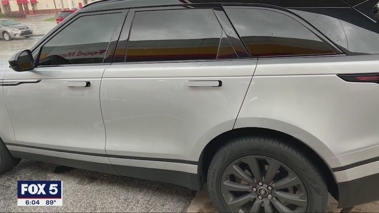 Carjackers hold driver at gunpoint