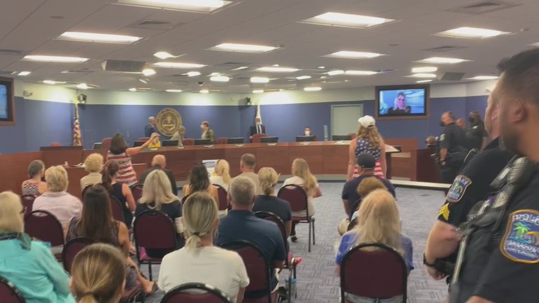 Mask opponents disrupt school board meeting before mandate passes