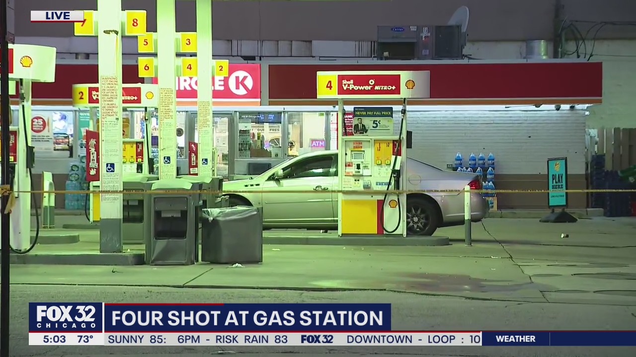 4 shot while sitting in vehicle at gas station on the Near North Side