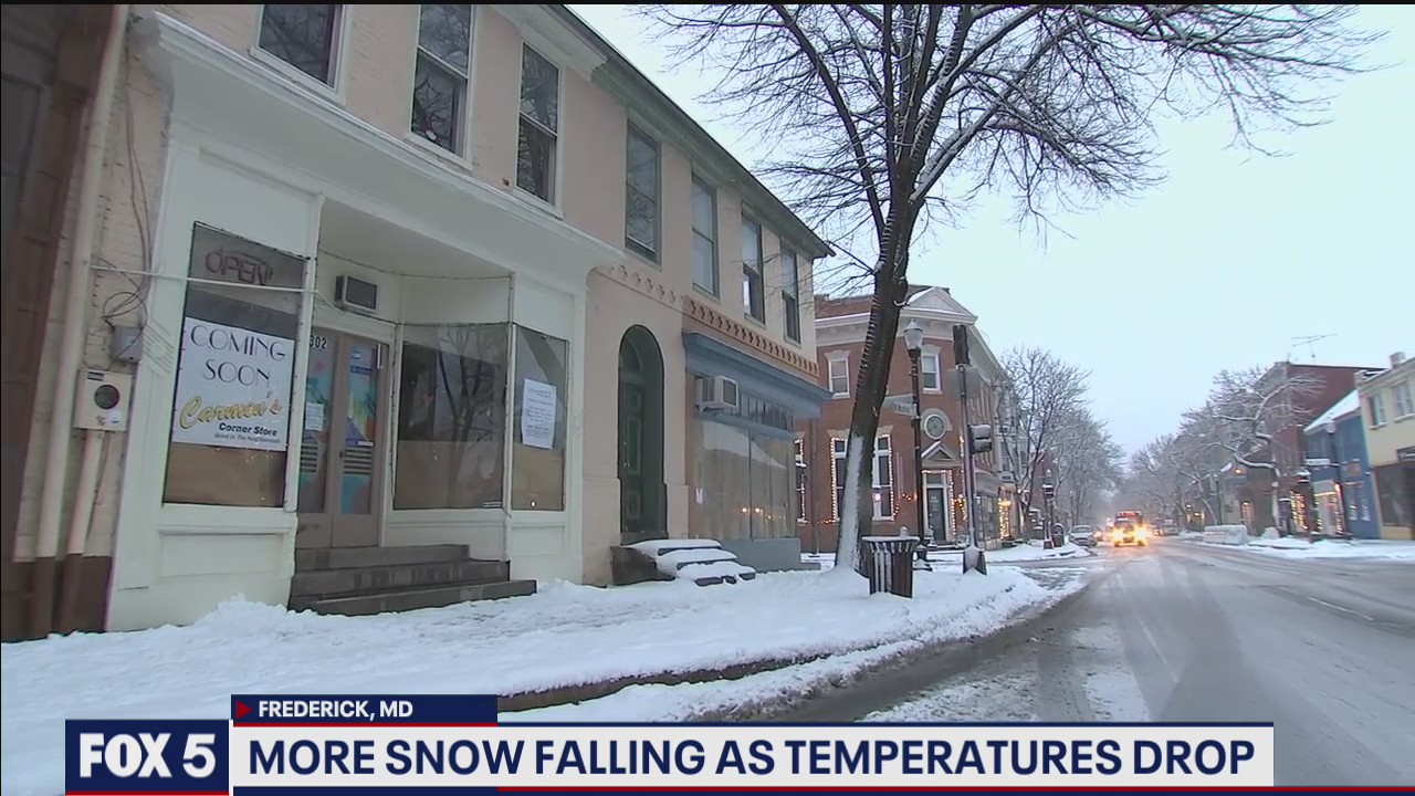 More snow falling as temperatures drop