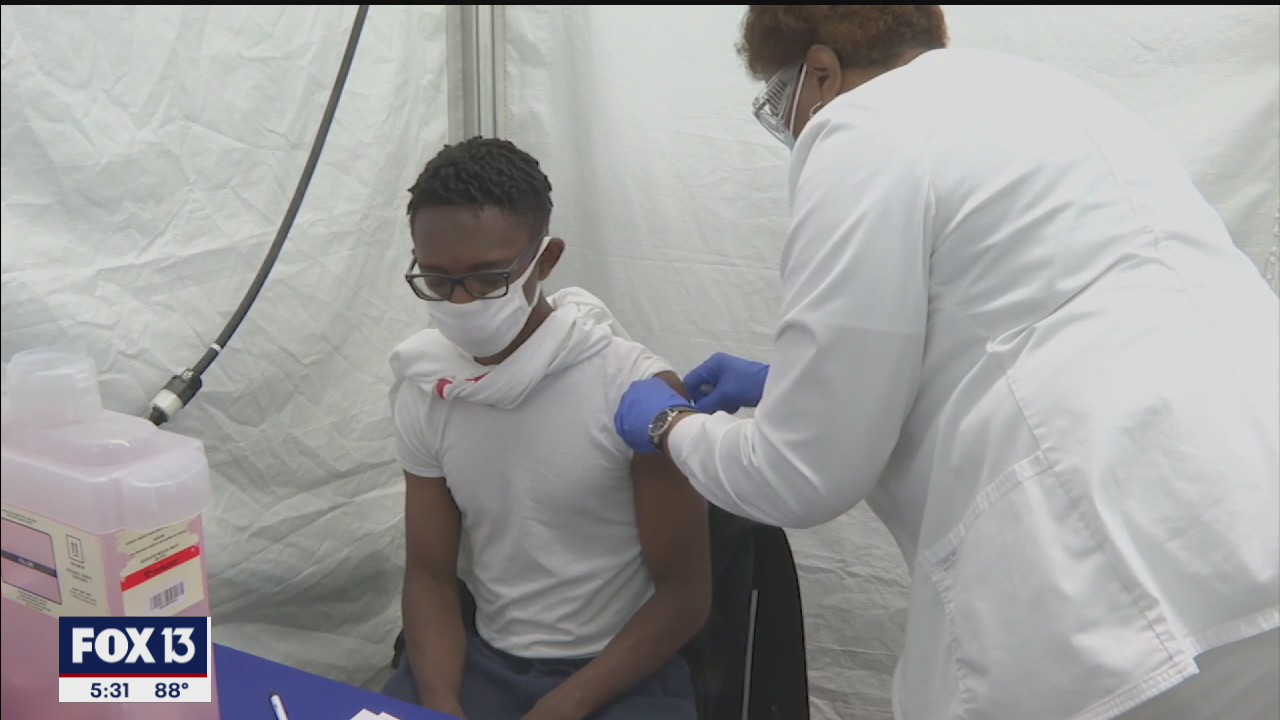 Kids get vaccines, aquarium tickets in Tampa