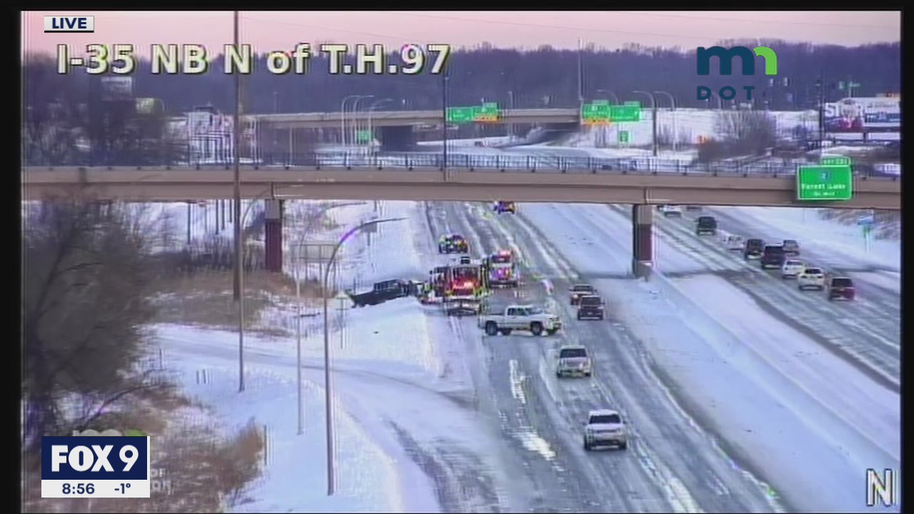 Truck spins out on slick ice near Forest Lake, Minnesota