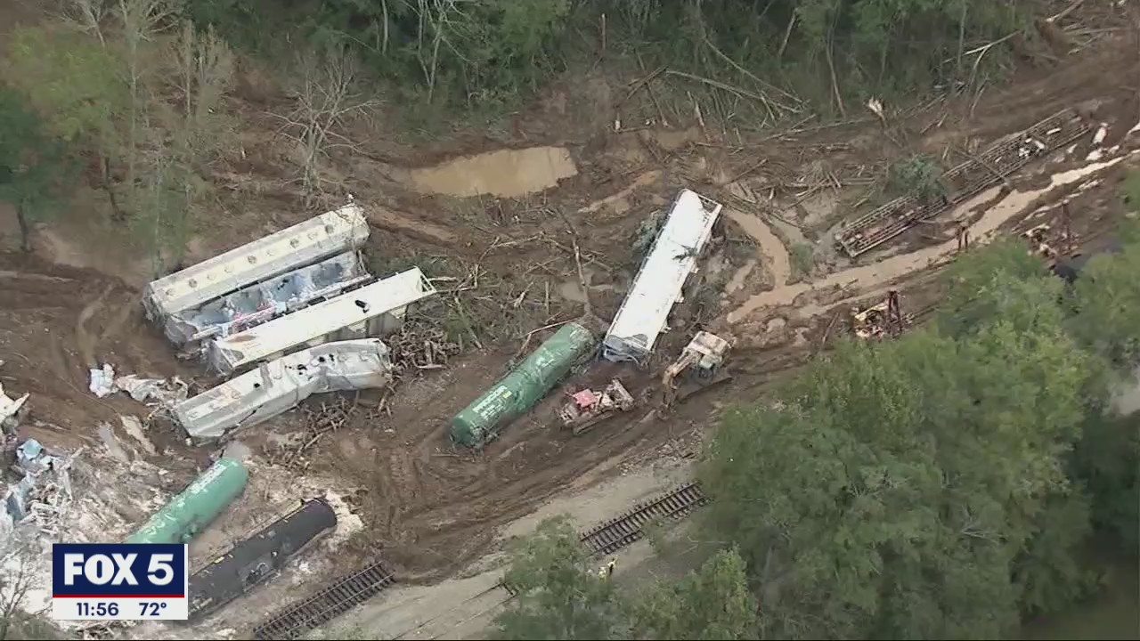 Officer runs into burning train