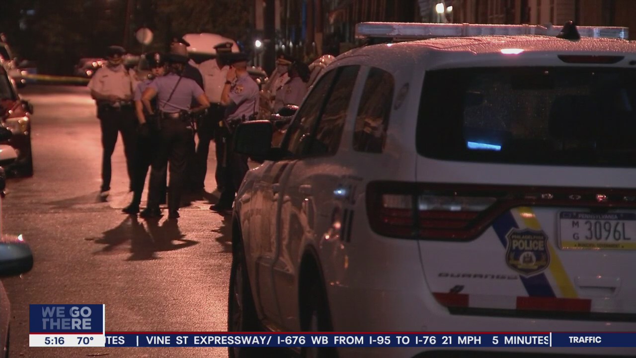 Police: 5 men shot on front porch of home in Logan