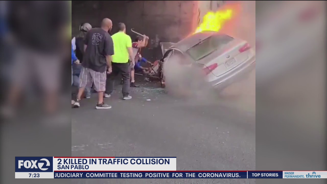 Bystanders attempt rescue from fiery crash