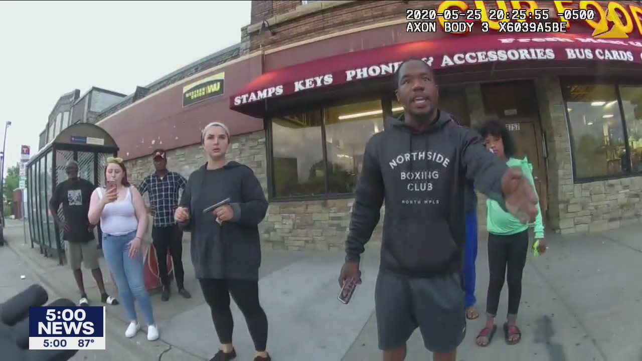 New body camera video of George Floyd's death shows Officer Tou Thao interacting with agitated bystanders