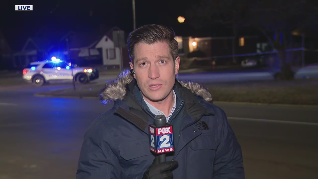 Detroit police at scene where dead body was discovered at Outer Drive and Drexel