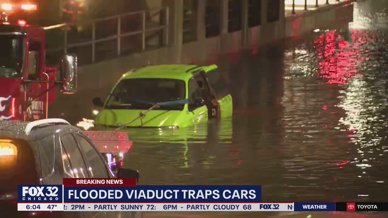 Overnight downpours flood local roads, stranding cars