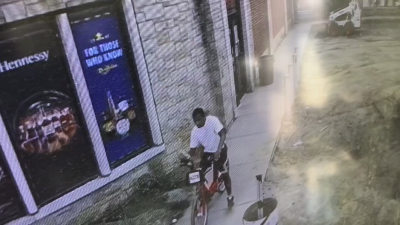 Upset customer chucks bricks at liquor store windows after being offered a free face mask